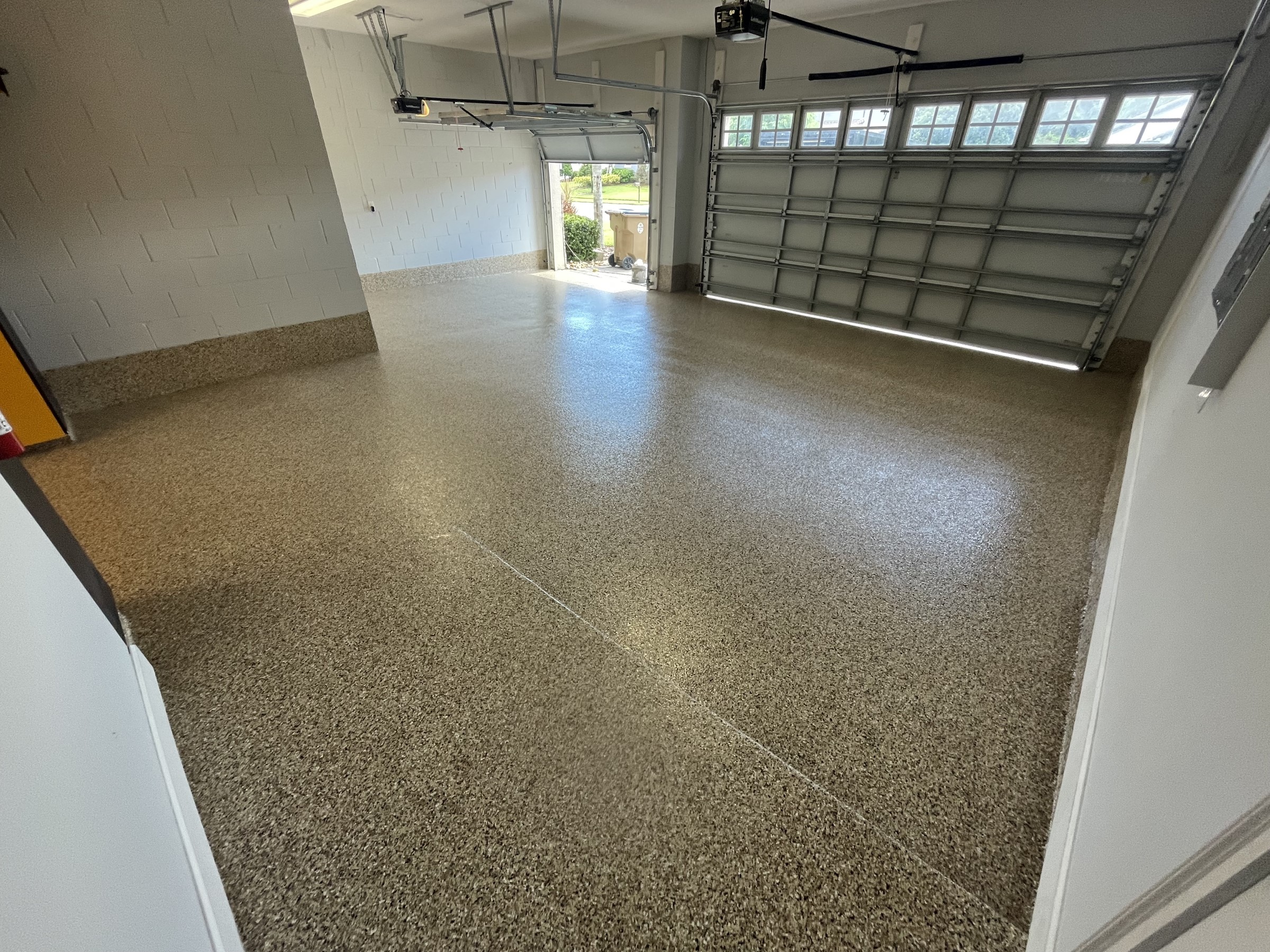 Decorative flake epoxy garage floor coating by S&S Concrete Coating