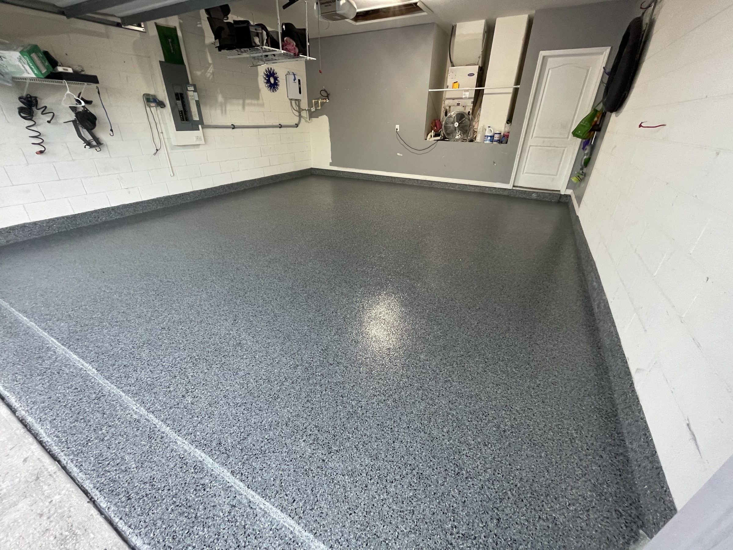 Epoxy flake garage floor installation in Ponte Vedra FL